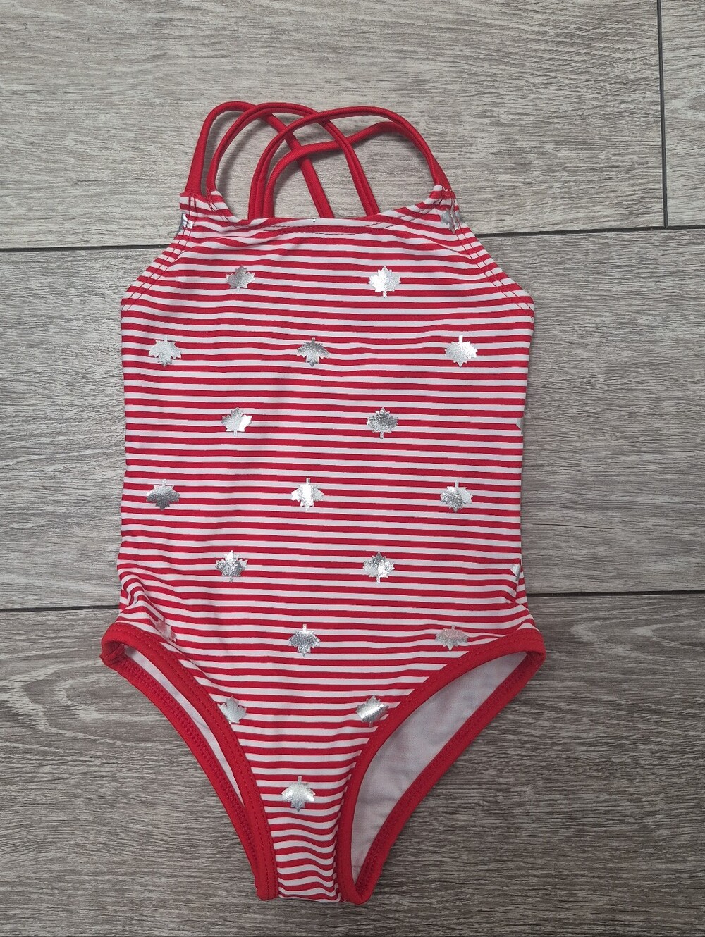 George Baby red & white striped 1pc swimsuit features silver maple leaf graphics